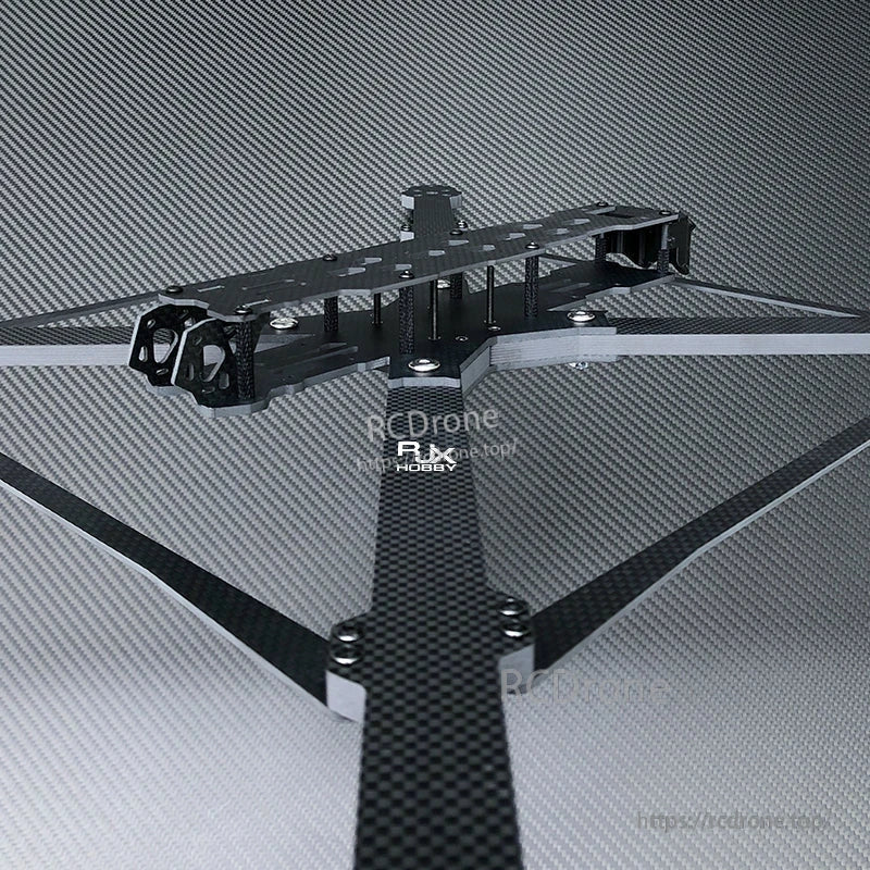 RJX X15 carbon fiber FPV racing drone frame kit with long arms, top plate, and standoff stack