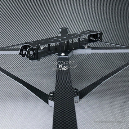 RJX X15 carbon fiber FPV racing drone frame kit with long arms, top plate, and standoff stack