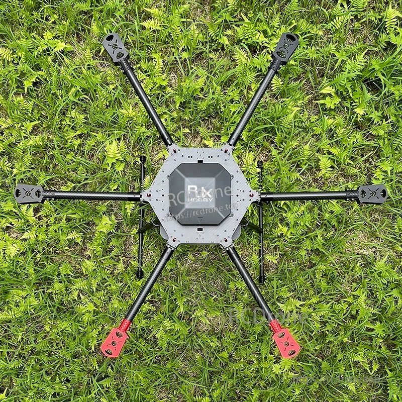 Carbon fiber folding hexacopter frame with six long arms, central plate, motor mounts and landing gear