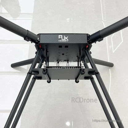 Underside view of RJX Hobby 1200mm carbon fiber quadcopter frame with folding arms and landing gear