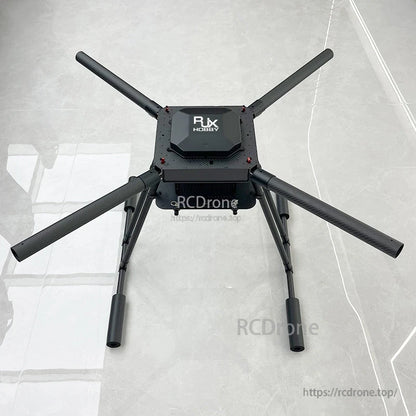 RJX Hobby carbon fiber folding quadcopter frame with four tube arms, center plate, and tall landing gear