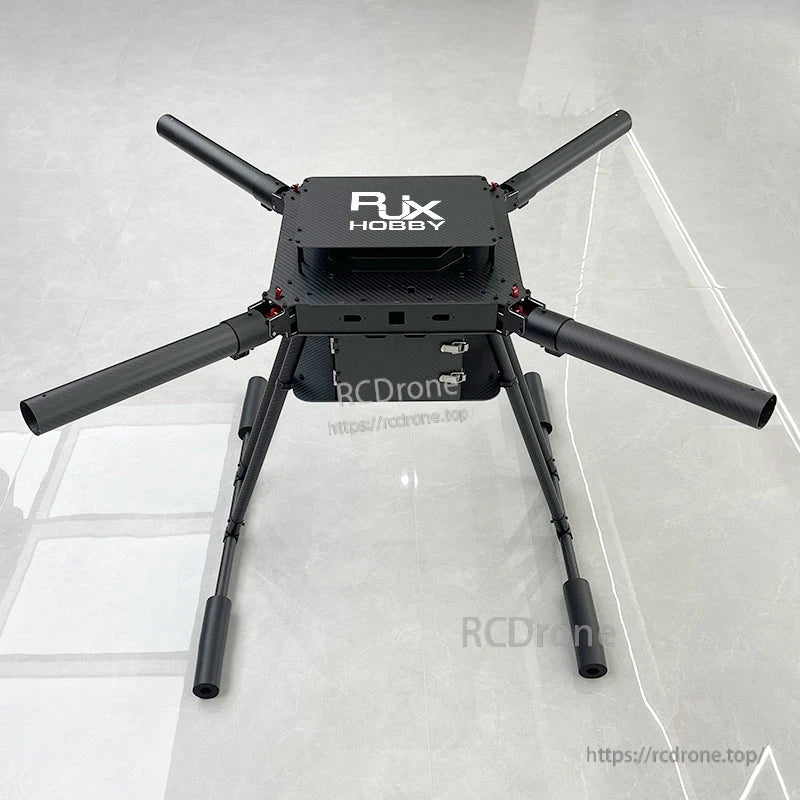 RJX Hobby carbon fiber folding quadcopter frame with four tubular arms and tall landing gear, no motors