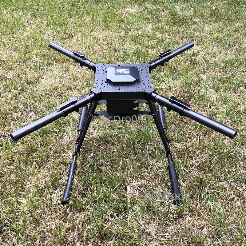 RJX1300C 1300mm carbon fiber folding quadcopter frame with integrated landing gear set up on grass