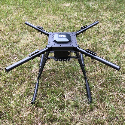RJX1300C 1300mm carbon fiber folding quadcopter frame with integrated landing gear set up on grass