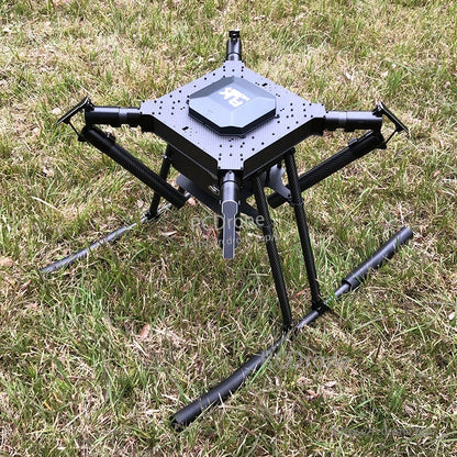 RJX1300C carbon fiber folding quadcopter frame with four arms, center plate, and tall landing gear