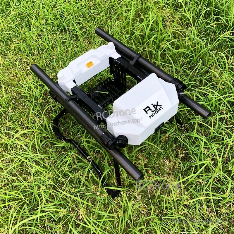 RJX1800 20L agricultural spraying drone frame kit with central tank and landing gear set on grass
