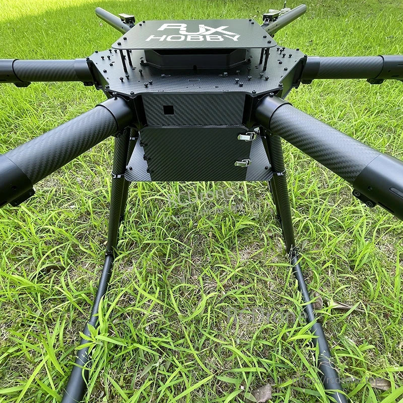 RJX Hobby carbon fiber hexacopter frame with tubular arms, stacked center plates, and lower battery tray