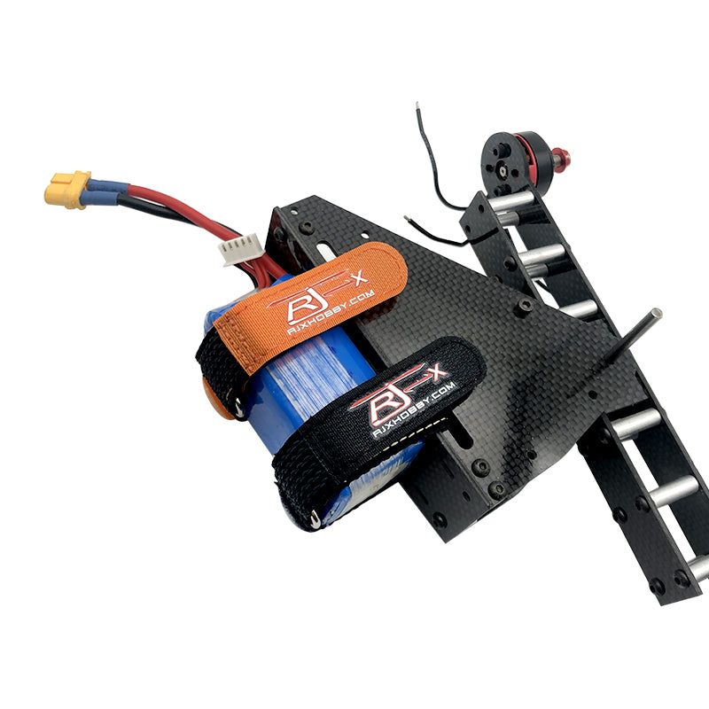 RJXHOBBY orange and black battery straps securing a LiPo pack to a carbon fiber RC chassis