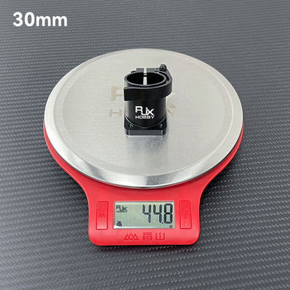 RJX Hobby 30mm quick-release tripod fixed seat clamp on a digital scale, showing 44.8g weight