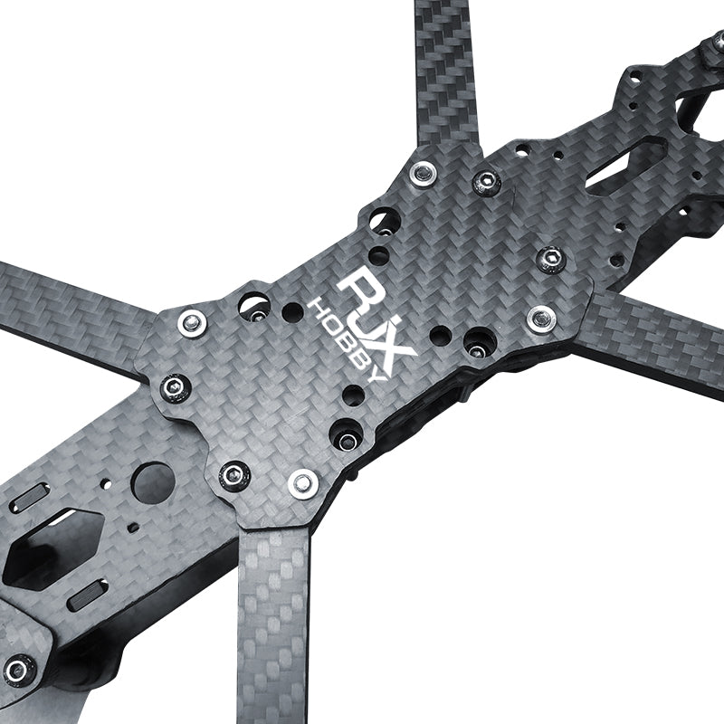 Carbon fiber drone parts, including plates and hardware, plus accessories.