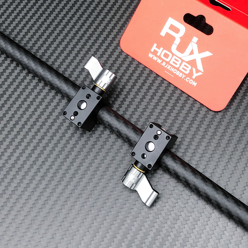 RJX 2pcs Tarot Mount, Two RJX Tarot-style black metal tube mounts with silver thumb screws clamped to a carbon fiber boom