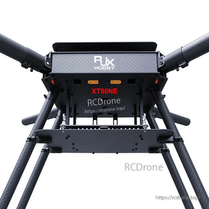 Underside view of RJX950B carbon fiber folding quadcopter frame with tube arms and XT90NE power connector