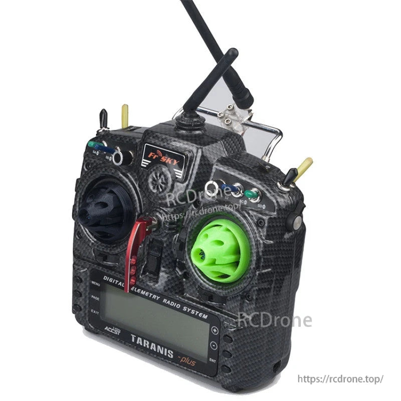 FrSky Taranis-style RC transmitter with a green 3D-printed protective cover fitted over the control stick gimbal