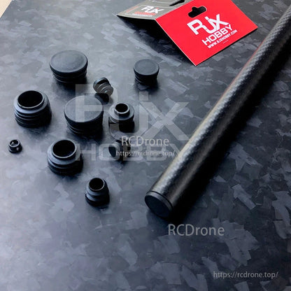RJXHOBBY 10pcs Carbon Fiber Pipe Plug, Assorted RJXHOBBY carbon fiber pipe plugs in multiple sizes next to a carbon fiber tube and packaging