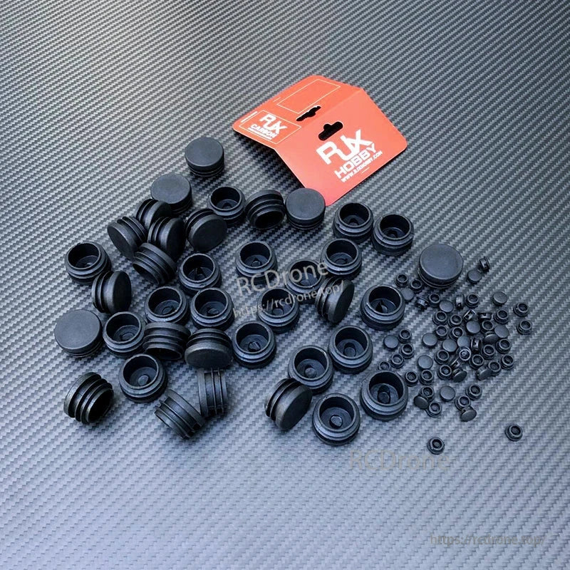 RJXHOBBY 10pcs Carbon Fiber Pipe Plug, Assorted RJXHOBBY black carbon fiber tube end plugs and small rubber caps on a carbon-fiber pattern surface