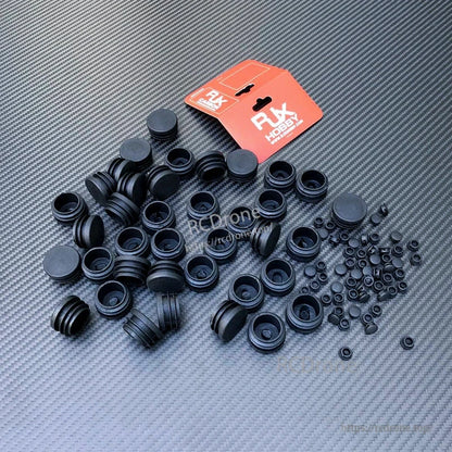 RJXHOBBY 10pcs Carbon Fiber Pipe Plug, Assorted RJXHOBBY black carbon fiber tube end plugs and small rubber caps on a carbon-fiber pattern surface
