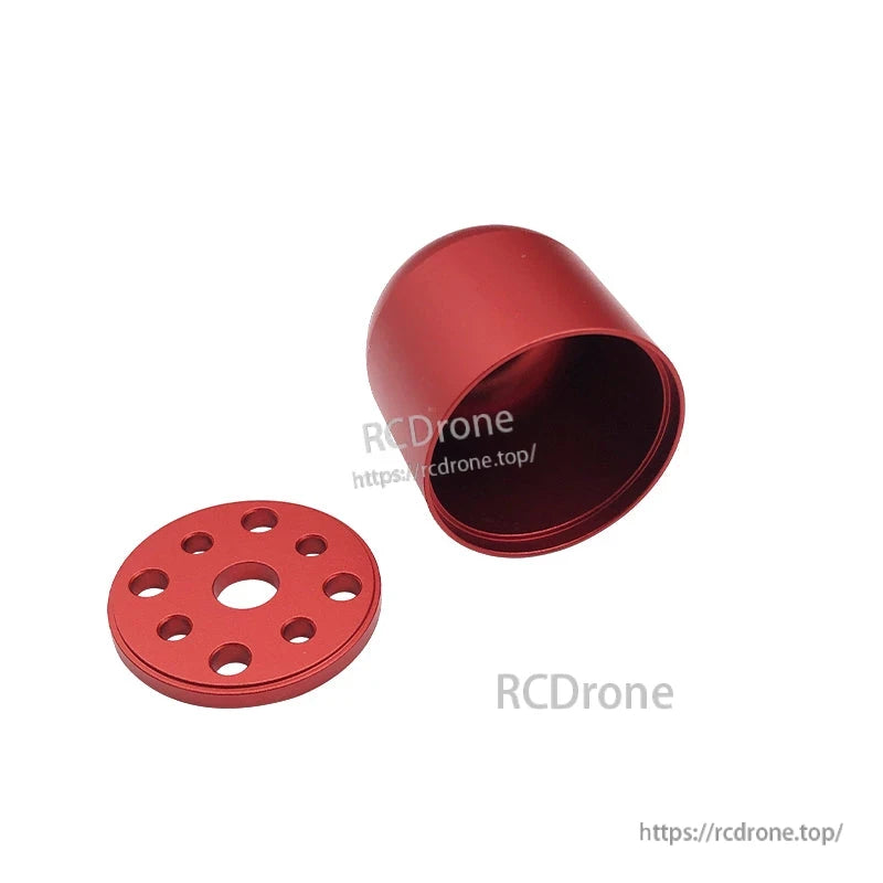 Red aluminum propeller spinner cover with matching backplate disc and multiple mounting holes