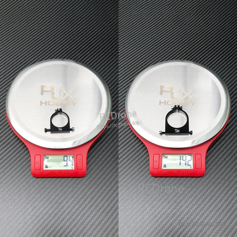 RJXHOBBY 1pc 25mm/30mm Pipe Clamp, RJXHOBBY pipe clamp on digital scale, black mount with bolt hardware, weight shown as 9.4g and 14.2g