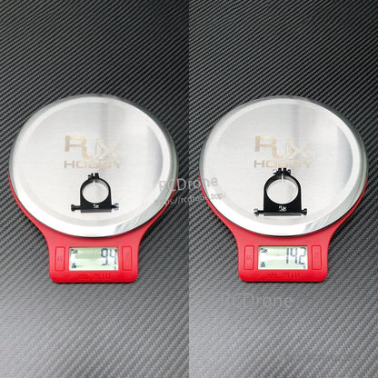 RJXHOBBY 1pc 25mm/30mm Pipe Clamp, RJXHOBBY pipe clamp on digital scale, black mount with bolt hardware, weight shown as 9.4g and 14.2g