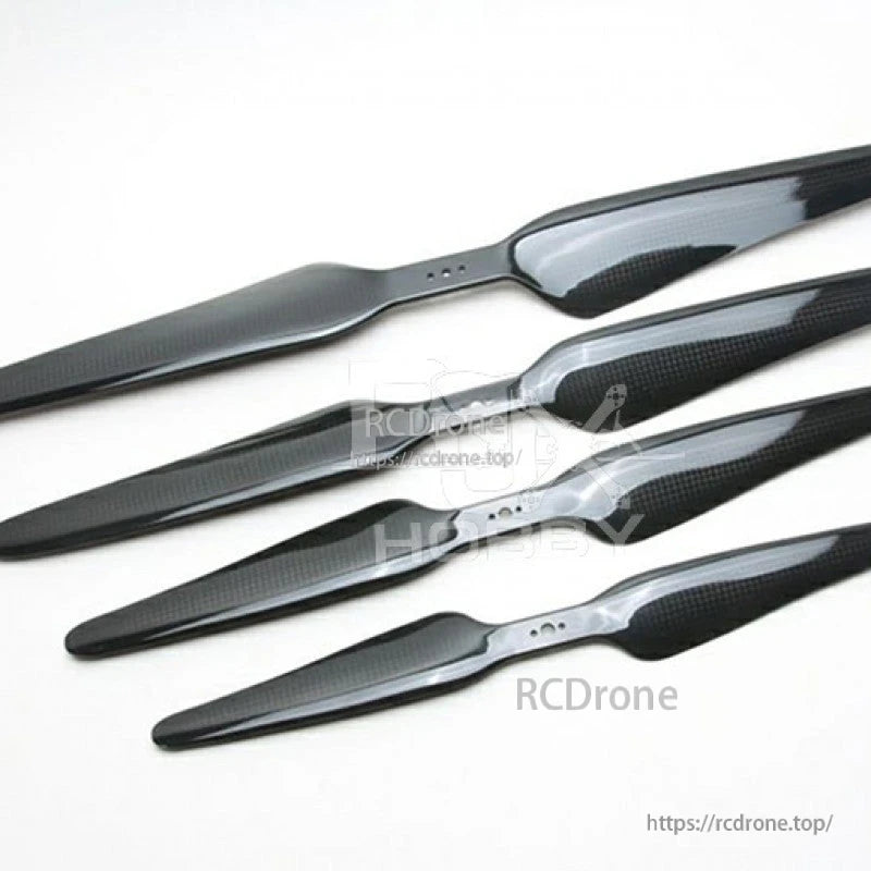 RJXHOBBY 21*10 Carbon Fiber Propeller, RJXHOBBY 21x10 carbon fiber two-blade propellers with glossy black finish and visible weave pattern