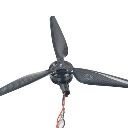 RJX 3-blade carbon fiber drone propeller mounted on motor hub with wiring, close-up view