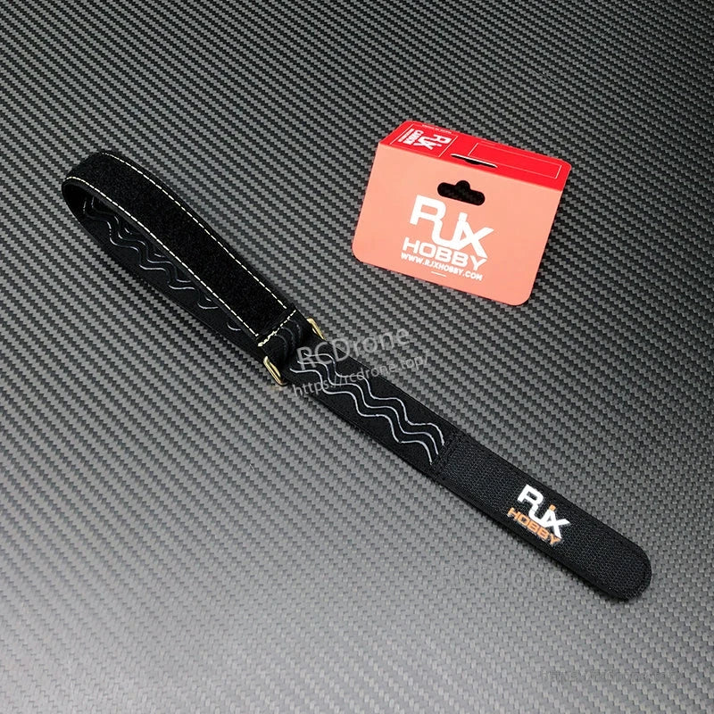RJXHOBBY black non-slip RC battery strap with stitched edges, wavy silicone grip pattern, and metal buckle