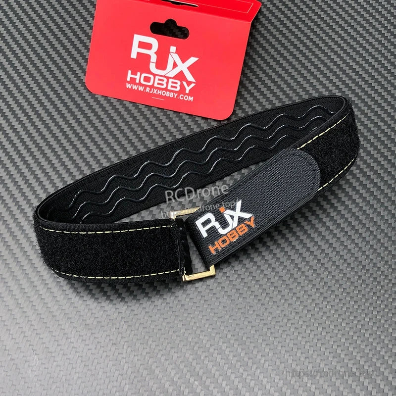 RJXHOBBY black non-slip silicone battery strap with stitched edges and metal buckle, hook-and-loop closure