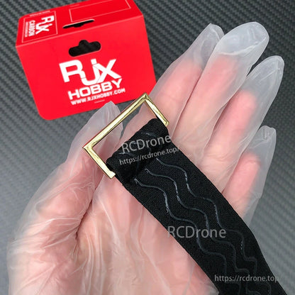 RJXHOBBY 30mm black silicone battery strap with metal buckle and non-slip wavy grip texture