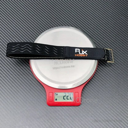RJXHOBBY 30mm non-slip silicone battery strap with zinc alloy buckle on a scale reading 22.0g