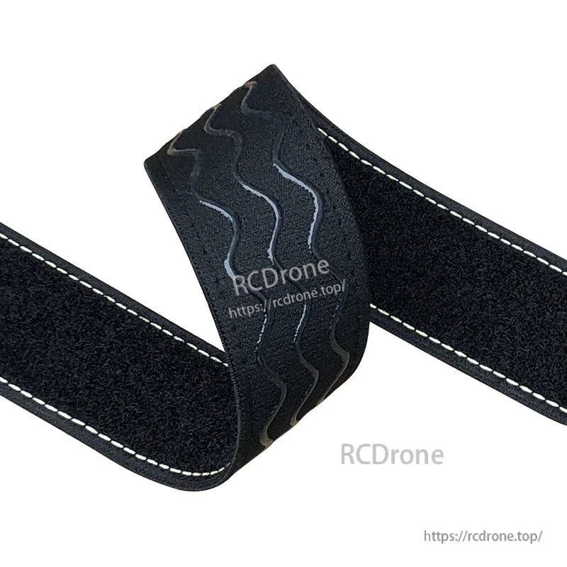 Black non-slip silicone battery strap with white stitched edges and grippy wavy texture for RC builds