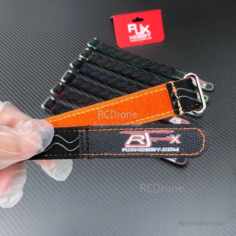 RJXHOBBY RC drone battery strap with orange stitched lining, RJX logo and metal buckle