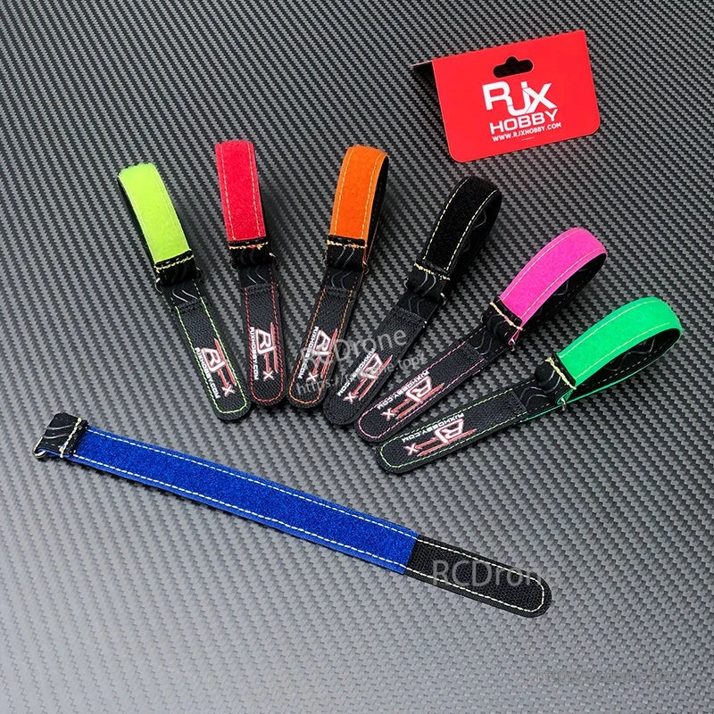 Assorted RJXHOBBY stitched hook-and-loop battery straps in multiple colors with logo patch and loop end