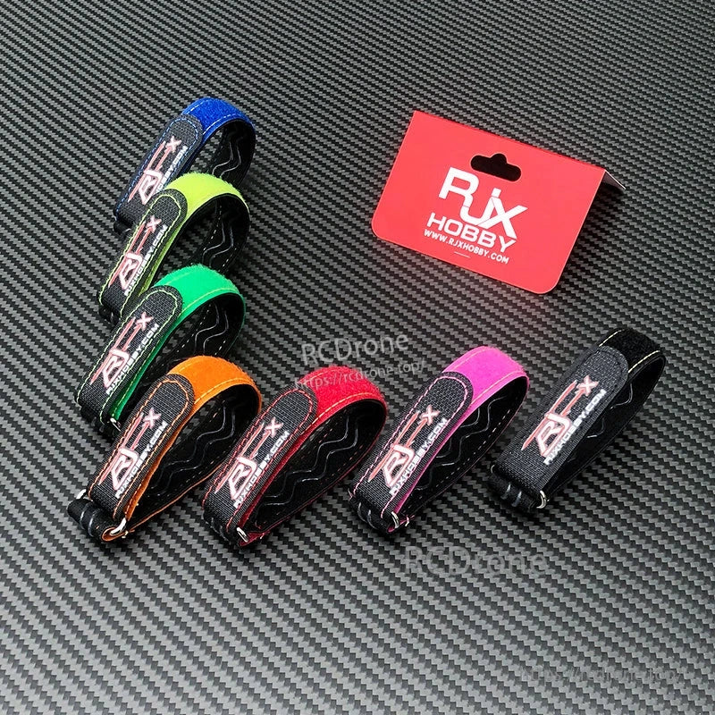 Assorted-color RJX HOBBY non-slip silicone battery straps with stitched edges and metal buckles