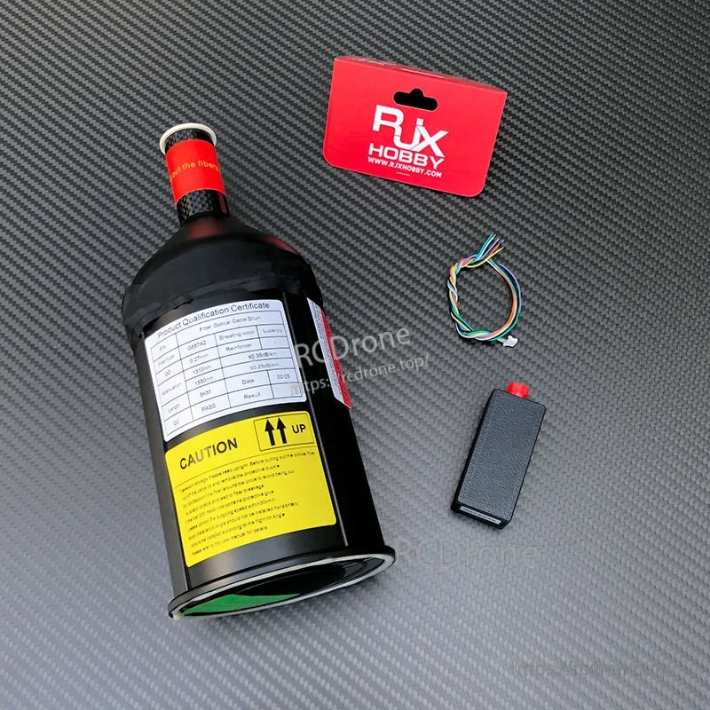 RJXHOBBY fiber-optic data link spool canister with small interface module and wiring harness for FPV drones