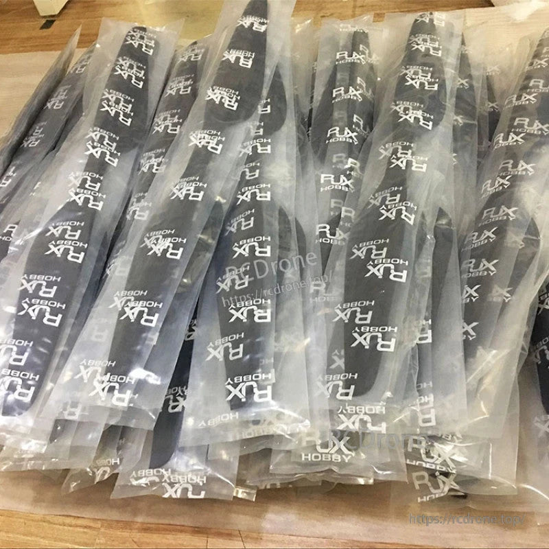 RJXHOBBY 30x10.5in Carbon Fiber Propeller, RJXHOBBY carbon fiber propeller blades packaged in clear sleeves, with branded printing on each blade