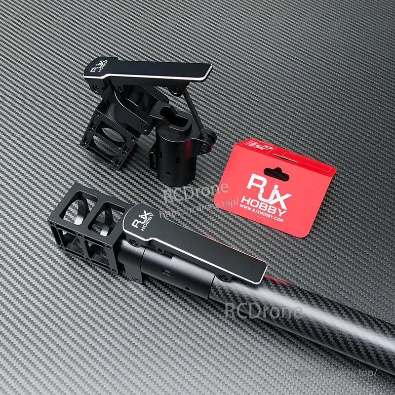 RJXHOBBY black aluminum folding side arm clamp mounted on a carbon tube with RJXHOBBY packaging