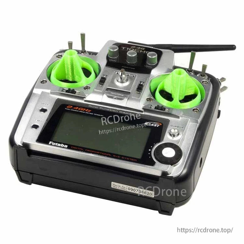 RC transmitter with bright green 3D printed gimbal stick (rocker) covers installed on both control sticks