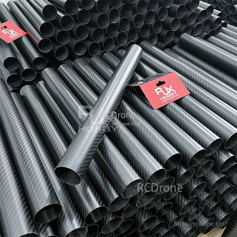 RJXHOBBY 3K Carbon Fiber Round Tube, Stack of RJXHOBBY carbon fiber round tubes with a woven 3K pattern and open ends