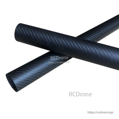 RJXHOBBY 3K carbon fiber round tube with woven finish, shown with two tubes crossed and one open end
