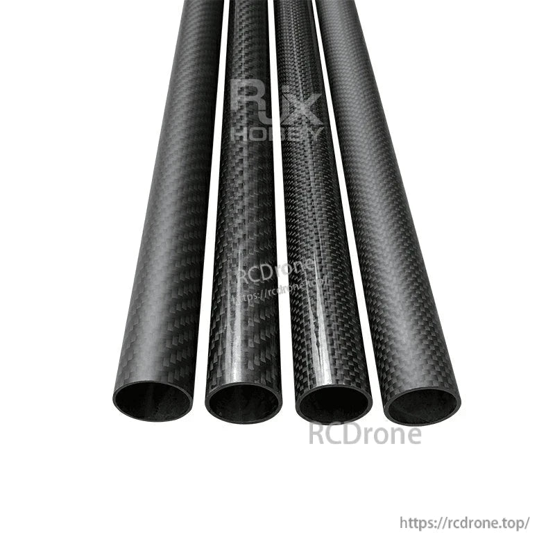 Four glossy 3K carbon fiber round tubes with visible weave pattern, hollow ends, for DIY hobby builds