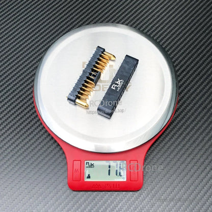 RJXHOBBY DJI Agras battery interface connector replacement pair with gold pins, shown on a scale (17.6 g)