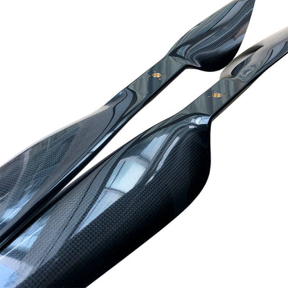 Close-up of RJXHOBBY 40x13 inch carbon fiber propeller blades with glossy woven finish