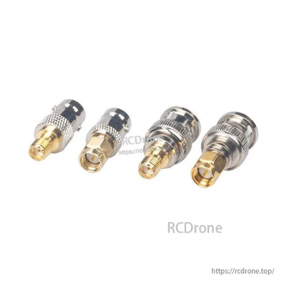 Set of four SMA to BNC RF coaxial adapters with gold-plated contacts and knurled metal bodies