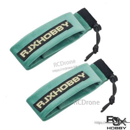 RJXHOBBY Blades and Propeller Protection Cover, Pair of green RJXHOBBY fabric propeller blade protection covers with black drawstring closures