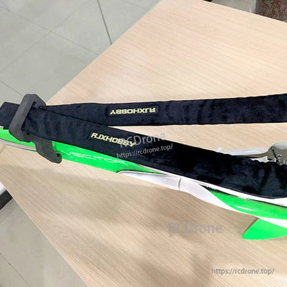 RJXHOBBY Blades and Propeller Protection Cover, RJXHOBBY black rotor blade and propeller protection cover strapped around green RC blades