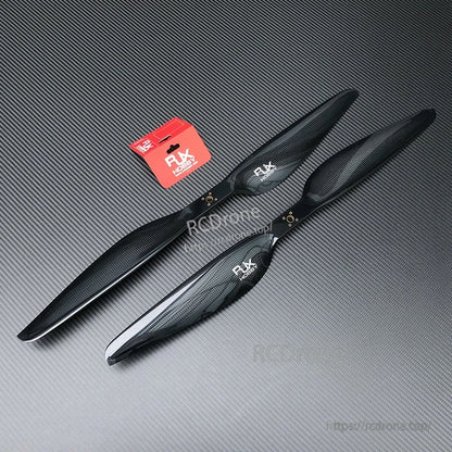 RJXHOBBY Carbon Fiber Propeller, RJXHOBBY carbon fiber two-blade propellers with glossy black finish on a textured background
