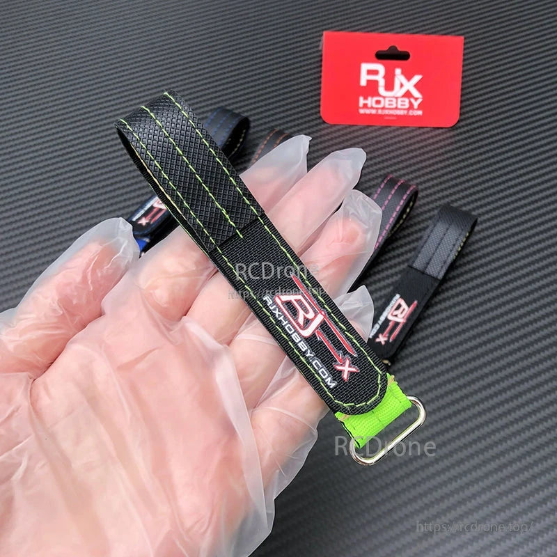 RJXHOBBY Kevlar Battery Strap, RJXHOBBY black battery strap with green stitching, hook-and-loop closure, and metal buckle end