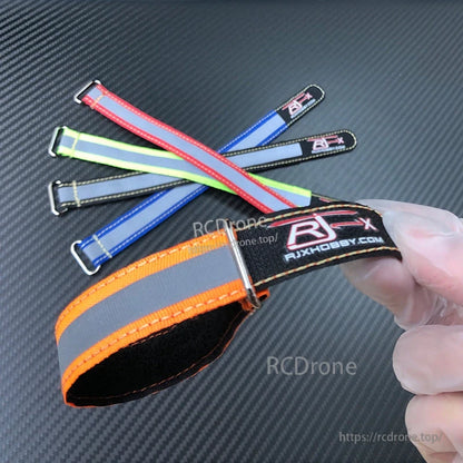 RJXHOBBY Reflective Battery Strap 2pcs, RJXHOBBY reflective hook-and-loop battery strap with metal buckle, shown in orange with reflective strip