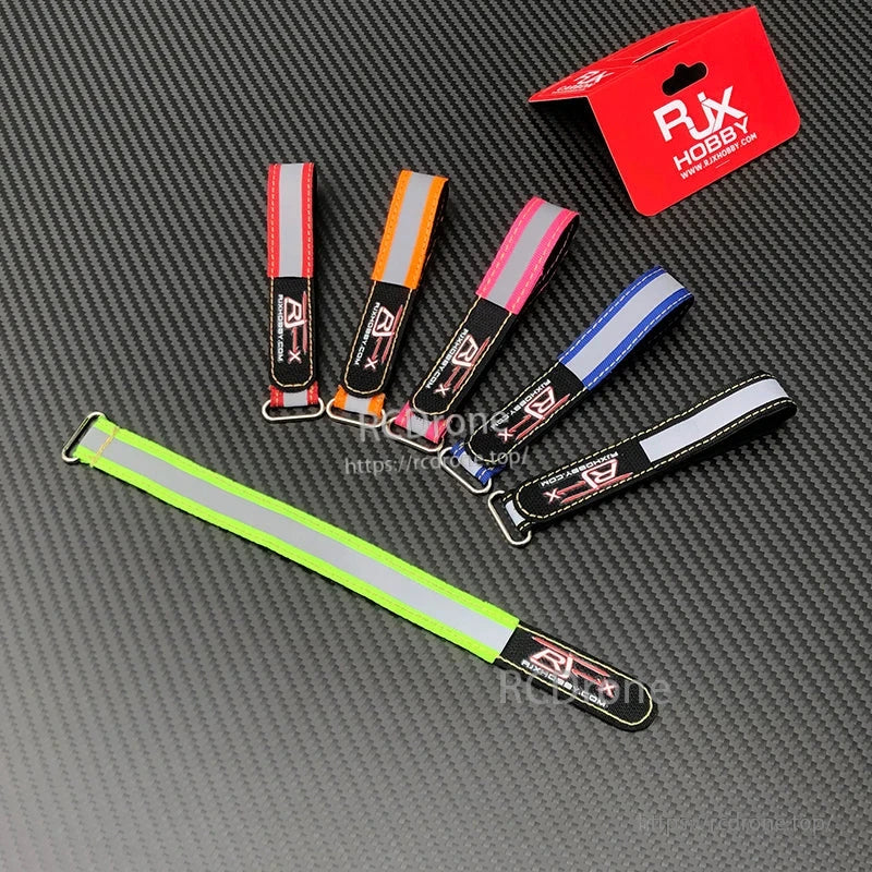 RJXHOBBY Reflective Battery Strap 2pcs, Assorted RJXHOBBY reflective battery straps with metal buckle, shown in multiple colors with reflective strip
