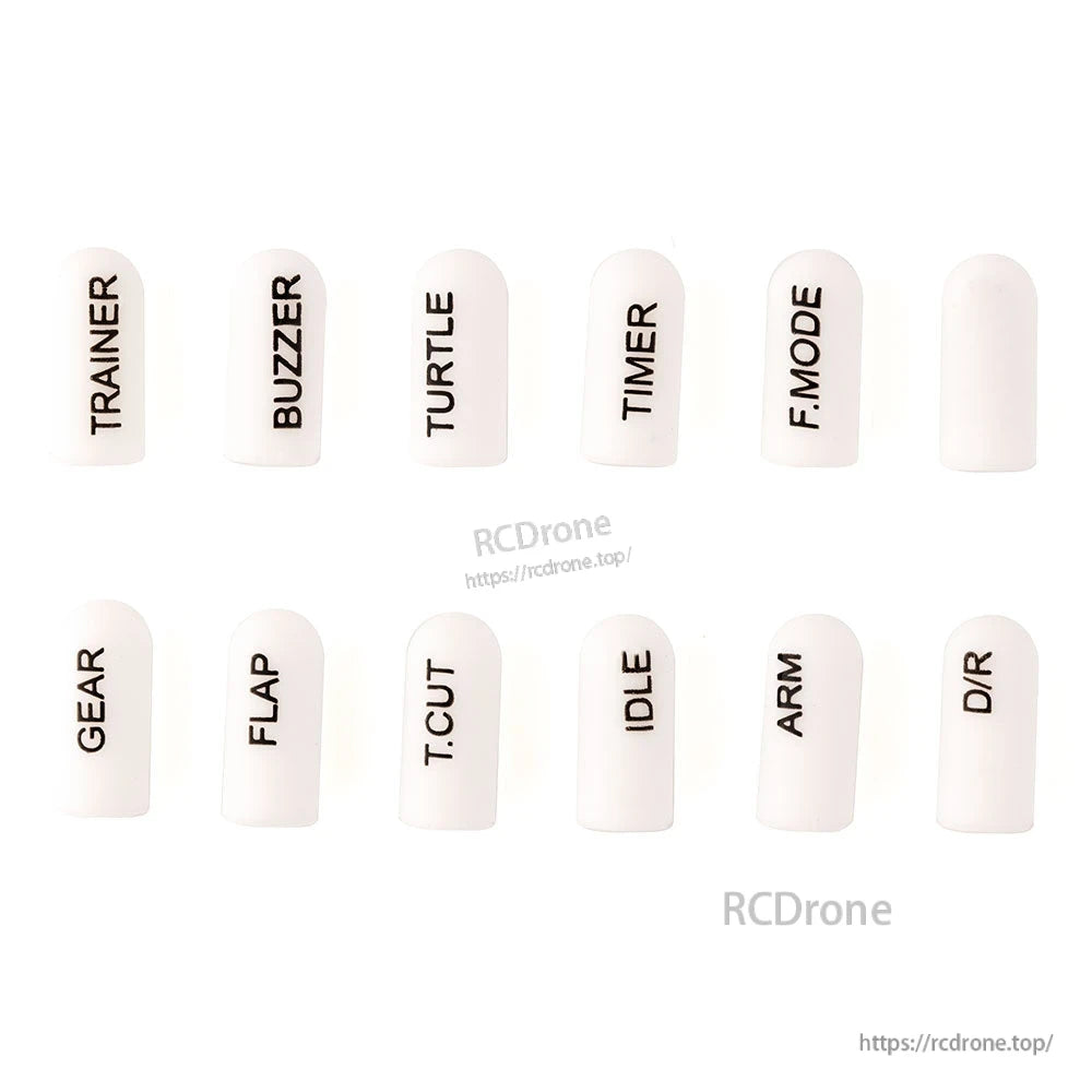 White short silicone switch cover set, 12 labeled dome caps with dark printed text